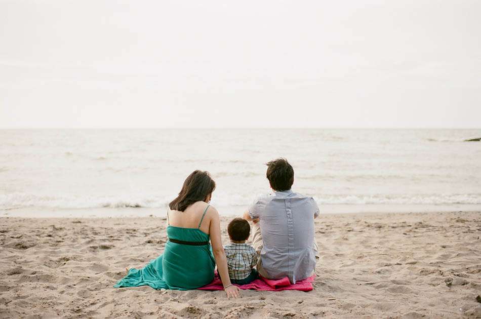 A summer family portrait session at Huntington Beach in Bay Village with Michelle, Amir and Michael.