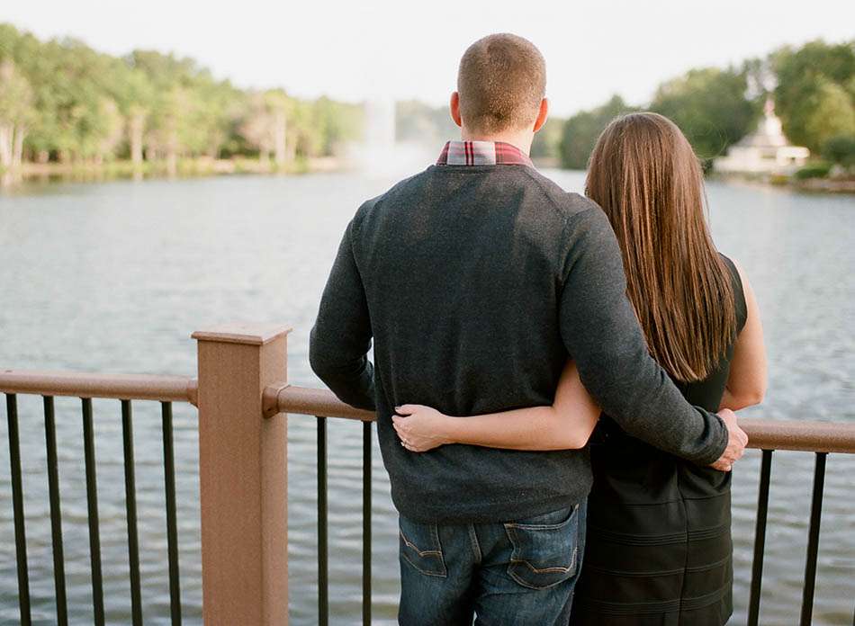 A summer sunset engagement session at Coe Lake captured on film with Sarah and Kyle