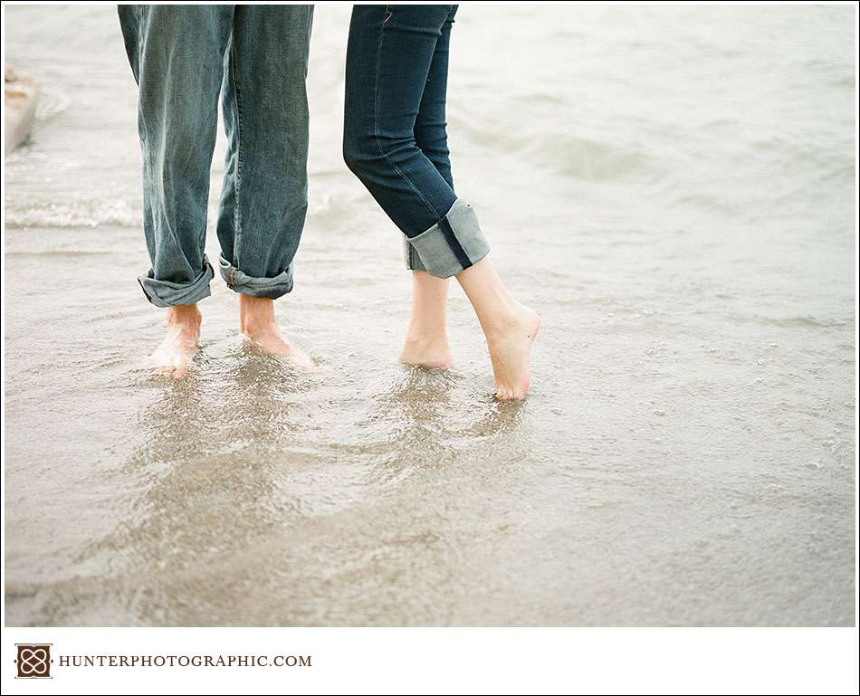 Beach engagement session in Lorain, Ohio featuring Kaye and Nathan
